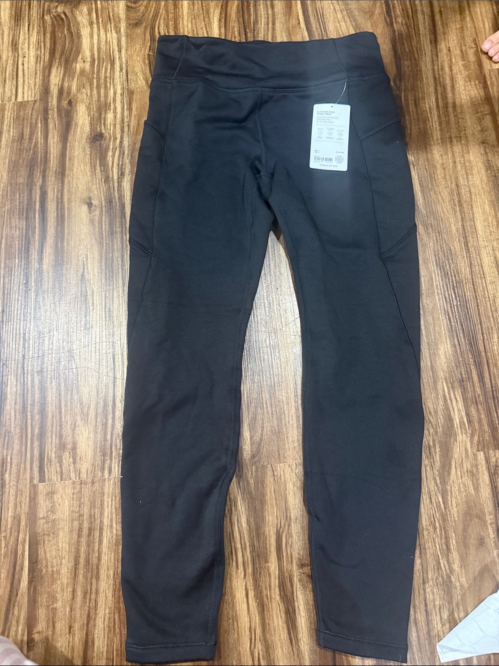 Athleta Black High-Rise Performance Leggings with Side Pockets